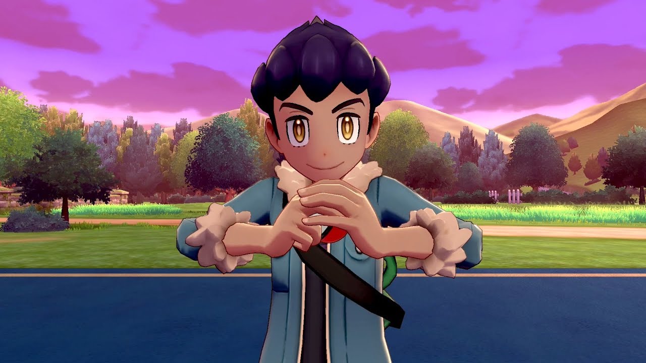 Hop the Pokémon trainer holding a Pokéball.