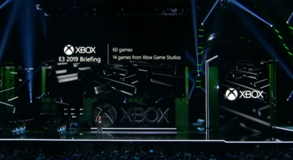 Xbox E3 press conference with a screen showing the text “60 games, 14 games from Xbox Game Studios.”