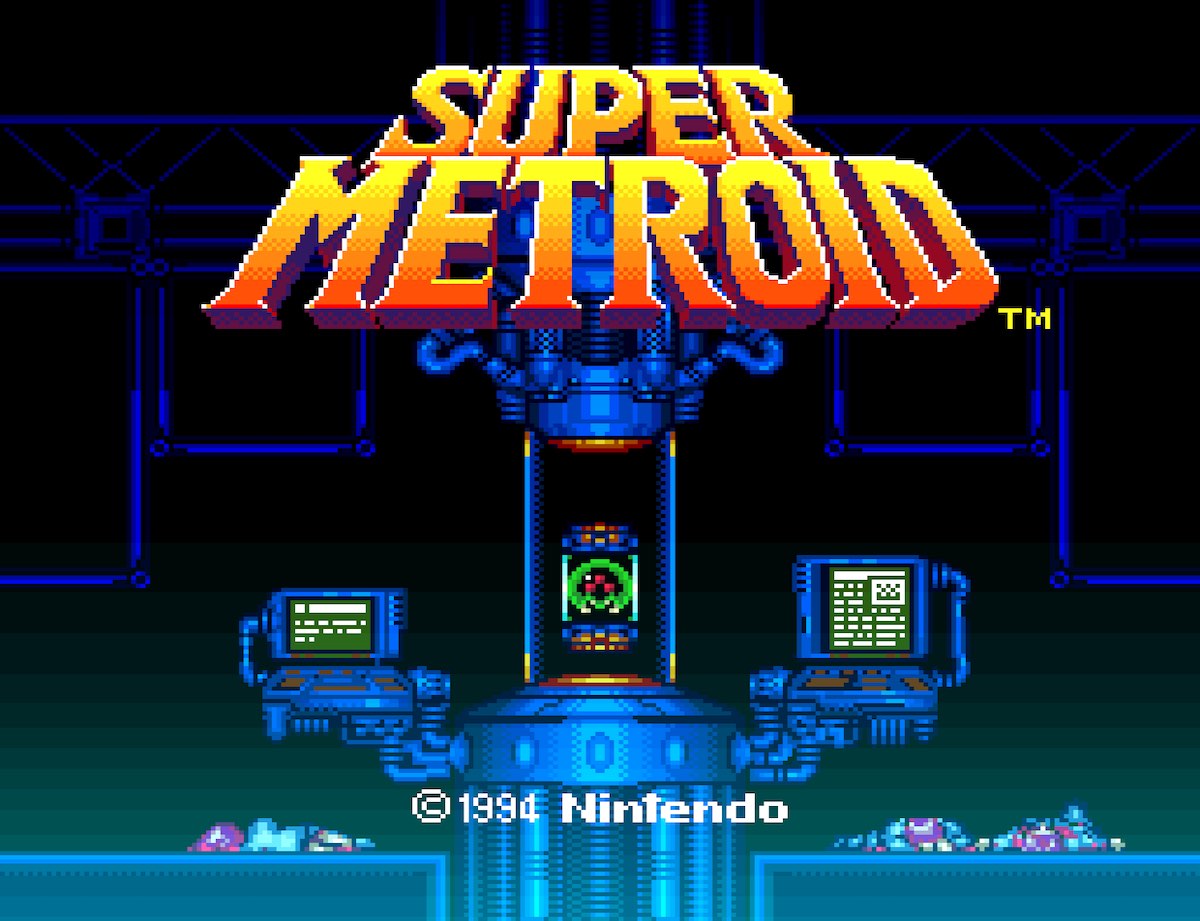 Title screen of Super Metroid. A small Metroid is floating in a tank with computer monitors nearby. Three scientists are dead on the floor.
