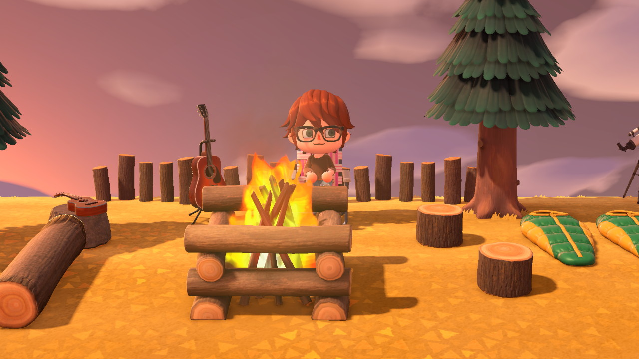 Animal Crossing screenshot of Evan sitting in front of a bonfire.