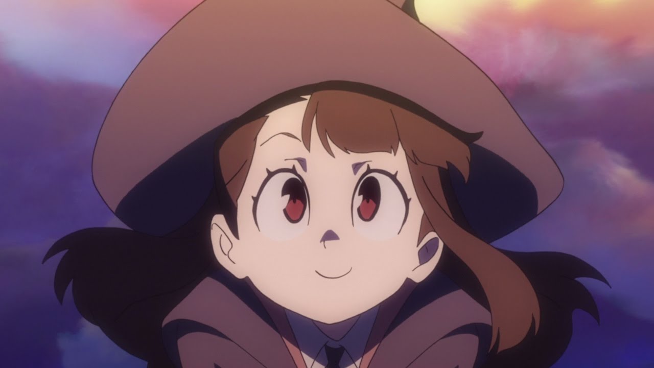 Akko from Little Witch Academia smiling and looking up