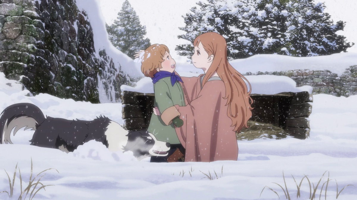 Maquia and her son Arial playing in the snow with their dog