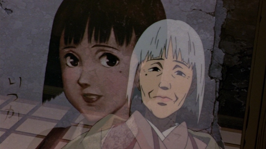 A painting of a young Chiyoko, with the older Chiyoko’s face looking back in the reflection in the glass frame.