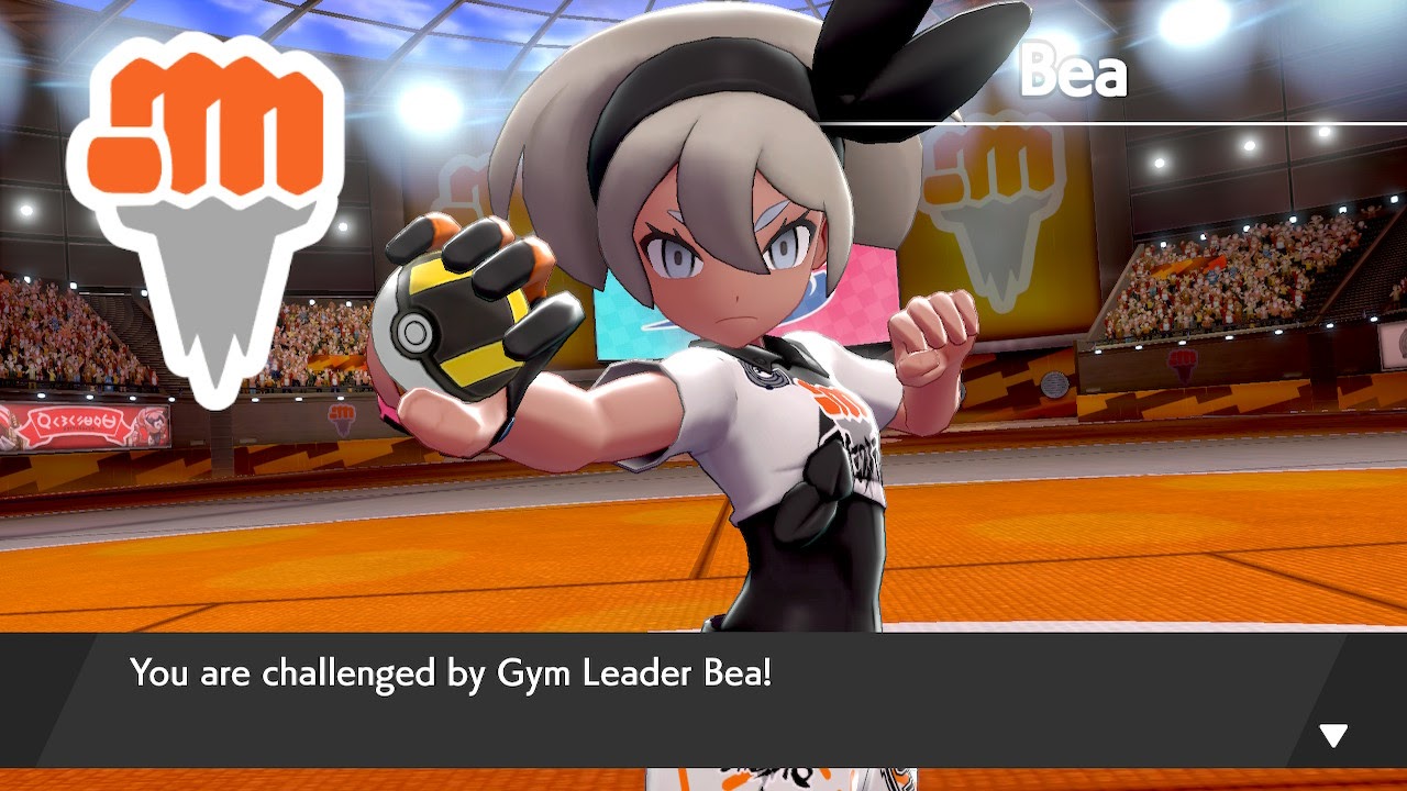 Fighting-type gym leader Bea challenges you to a battle. she has dark skin and gray hair.