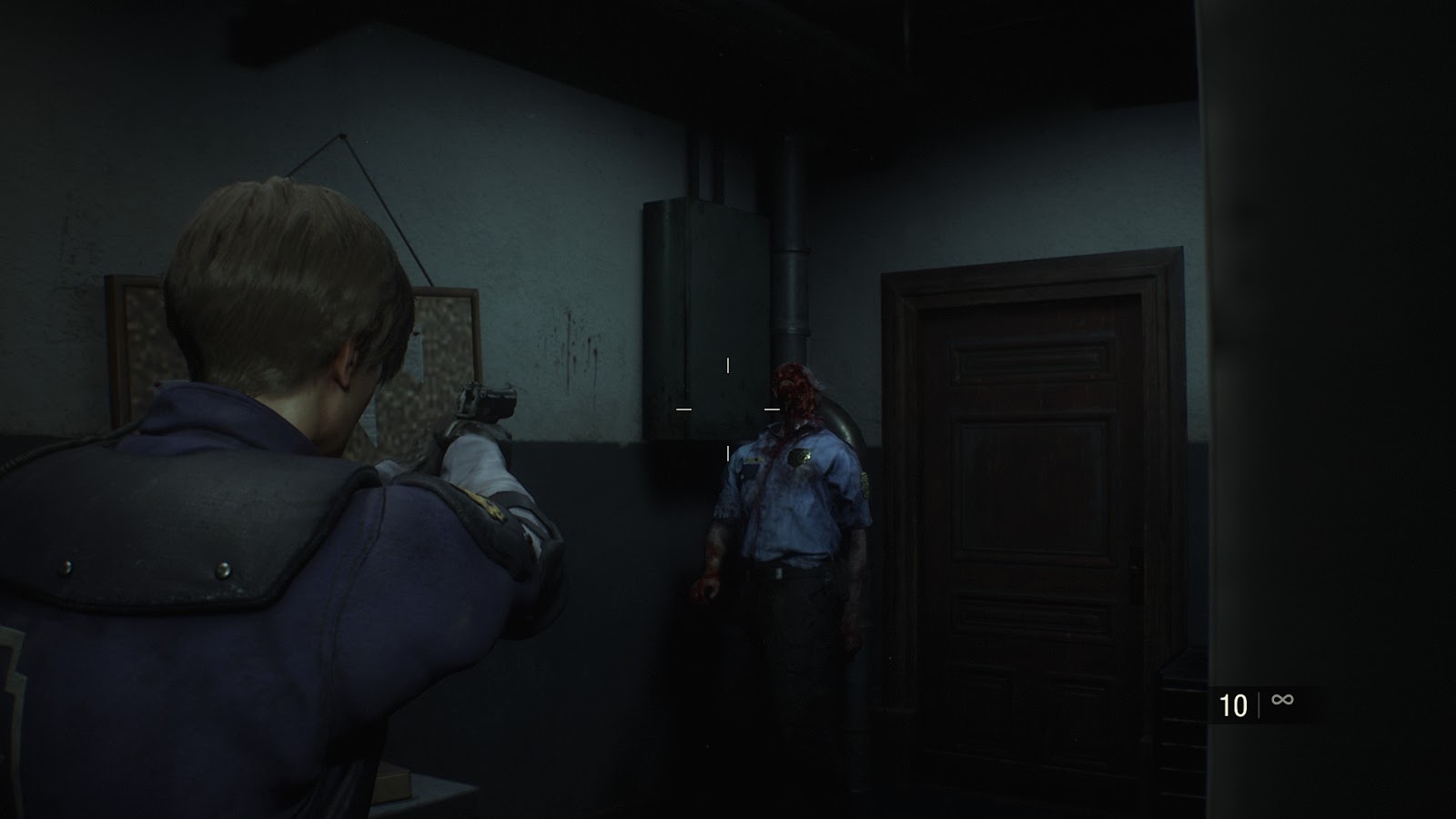 Leon from Resident Evil 2 Remake pointing his pistol at a zombie in a dark room.