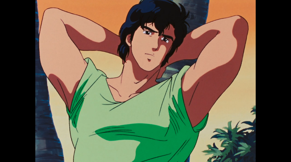 Ryo lounging in a t-shirt in a tropical location.