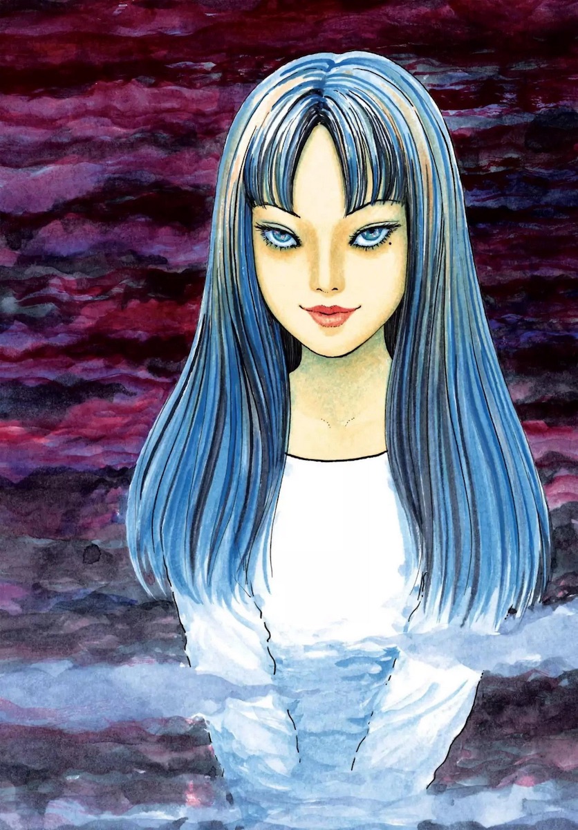 Tomie, a beautiful young girl with a beauty mark under her left eye.
